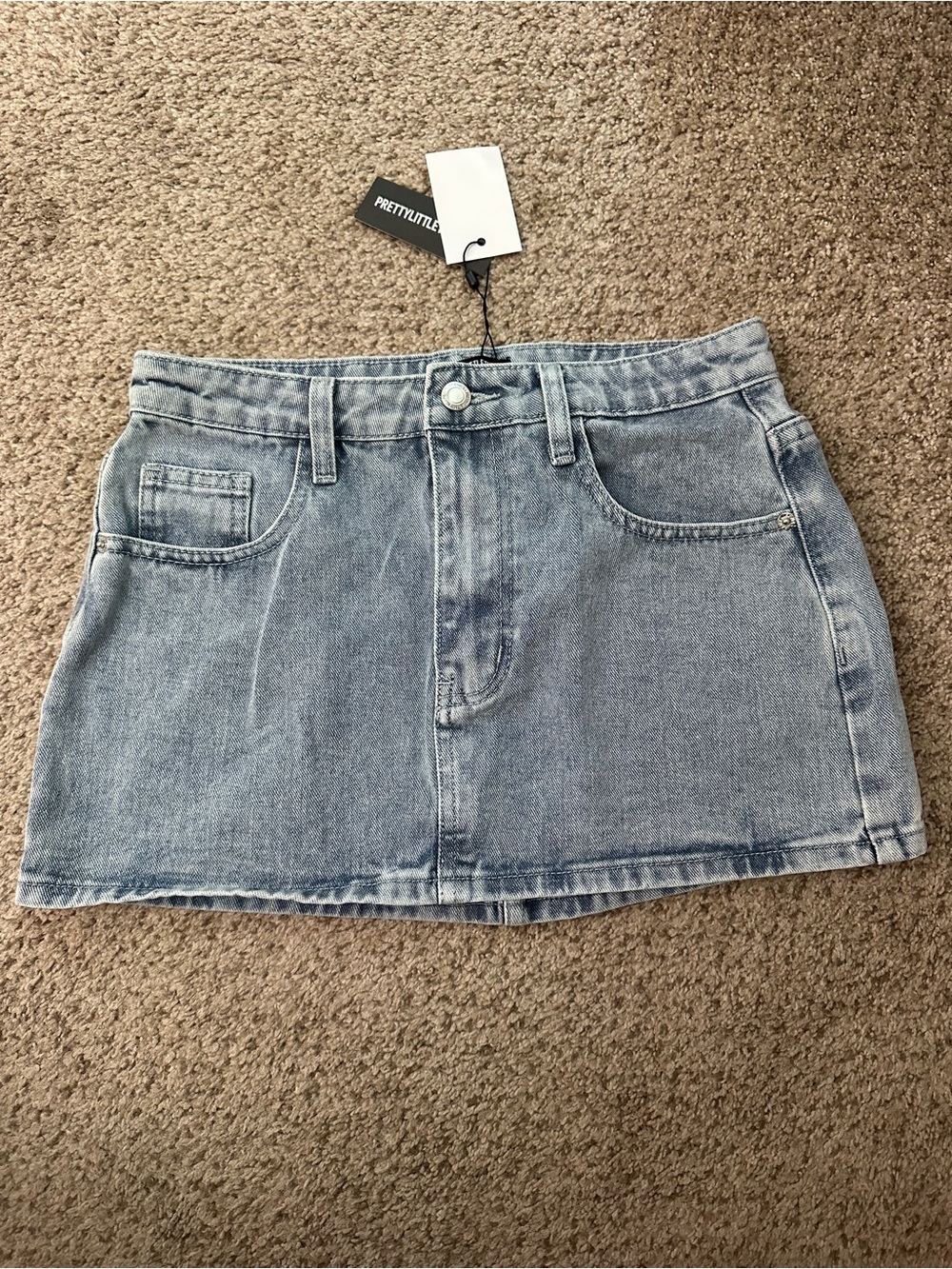PrettyLittleThing Light Blue Denim Mini Skirt with Front Pockets